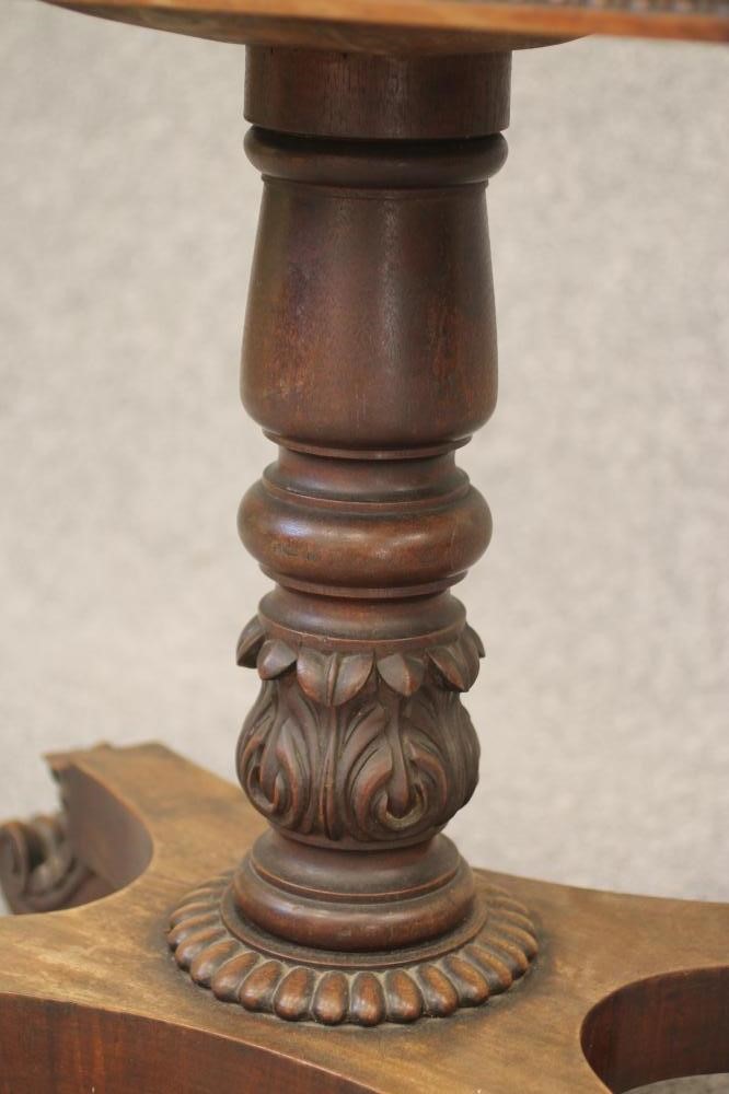 A MAHOGANY FOLDING CARD TABLE Image