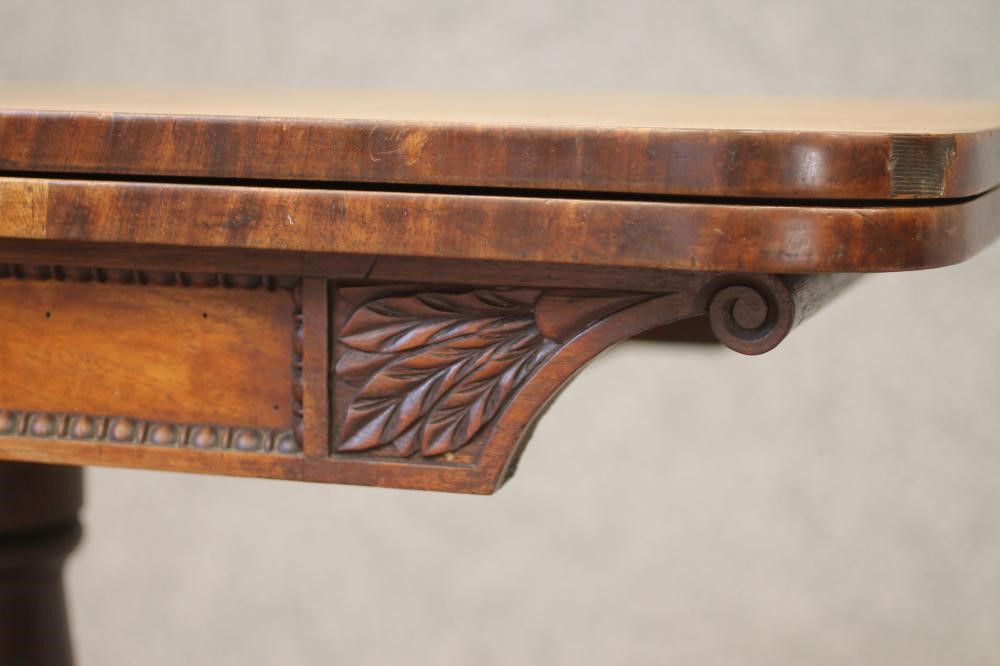 A MAHOGANY FOLDING CARD TABLE Image