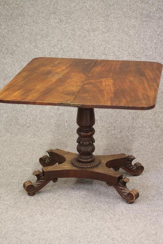 A MAHOGANY FOLDING CARD TABLE Image