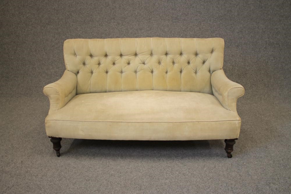 A VICTORIAN MAHOGANY FRAMED SOFA button upholstered in lime green dralon Image