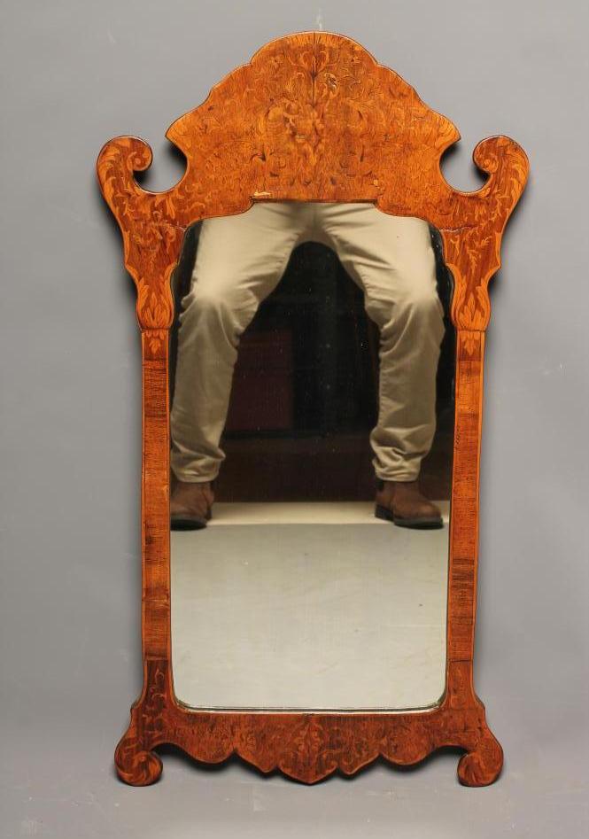 A DUTCH WALNUT AND MARQUETRY PIER GLASS Image