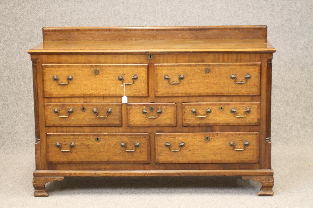 A GEORGIAN OAK AND MAHOGANY BANDED LANCASHIRE DRESSER Image