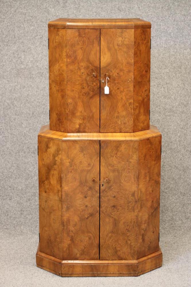 AN ART DECO BURR WALNUT COCKTAIL CABINET of oblong stepped faceted form Image