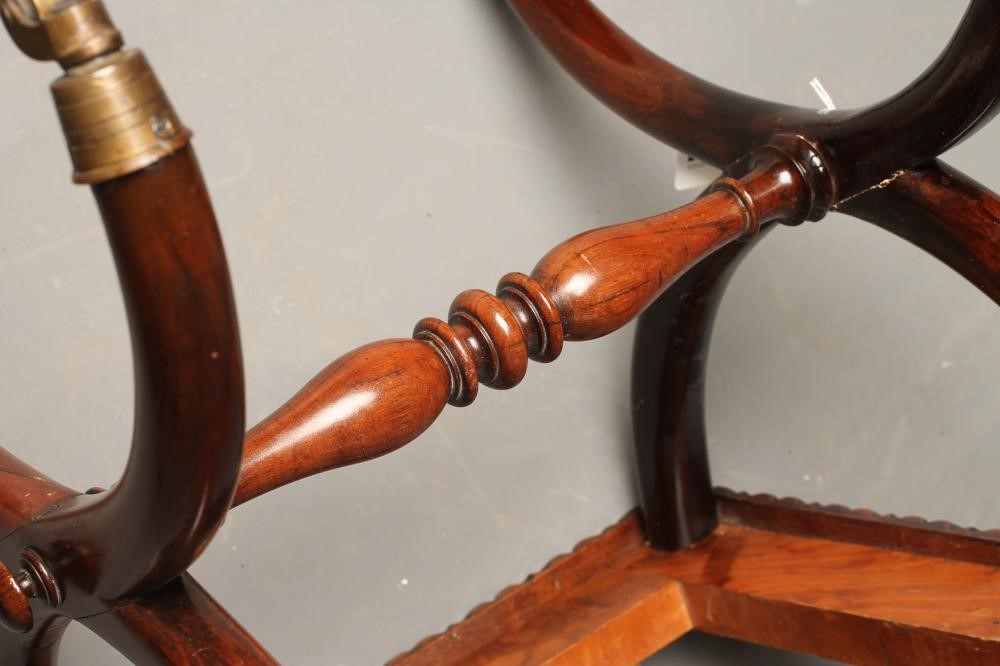 A ROSEWOOD X FRAMED STOOL Image