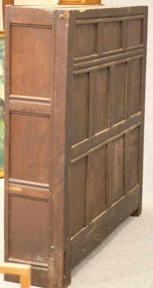 A JOINED OAK CUPBOARD Image