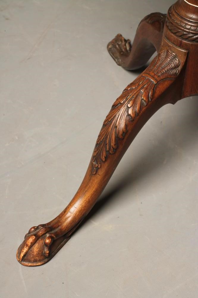 A MAHOGANY TRIPOD TABLE of Georgian design Image