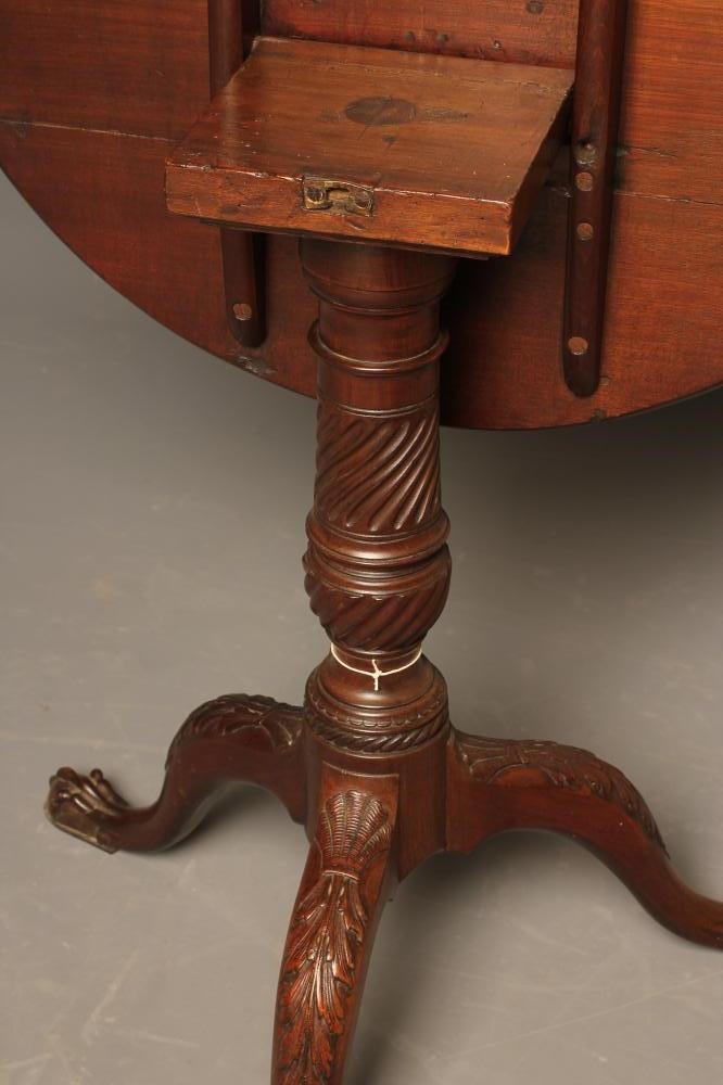 A MAHOGANY TRIPOD TABLE of Georgian design Image