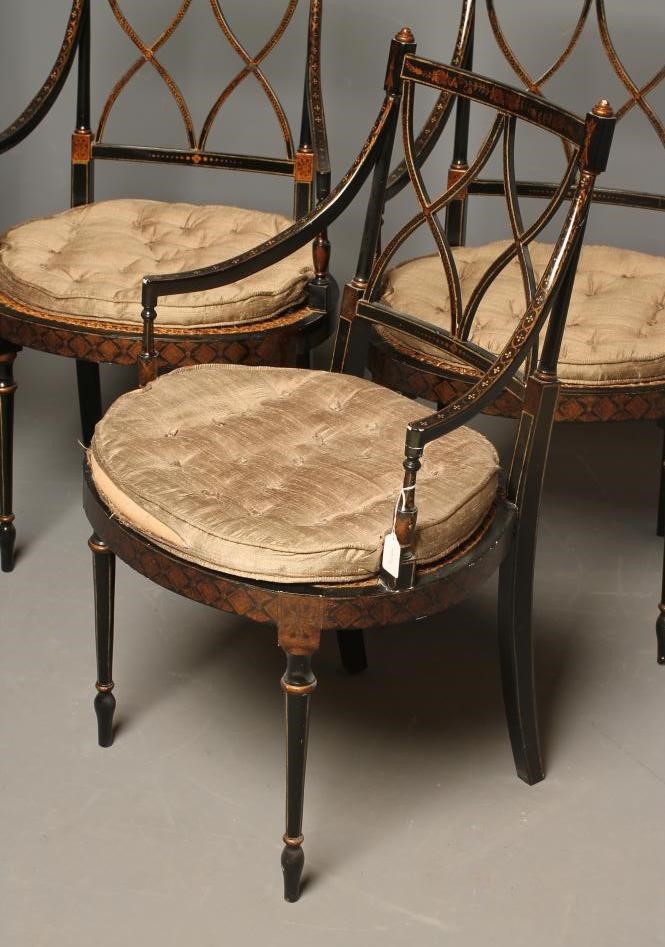 A SET OF FOUR REGENCY STYLE CANED AND PAINTED ELBOW CHAIR Image