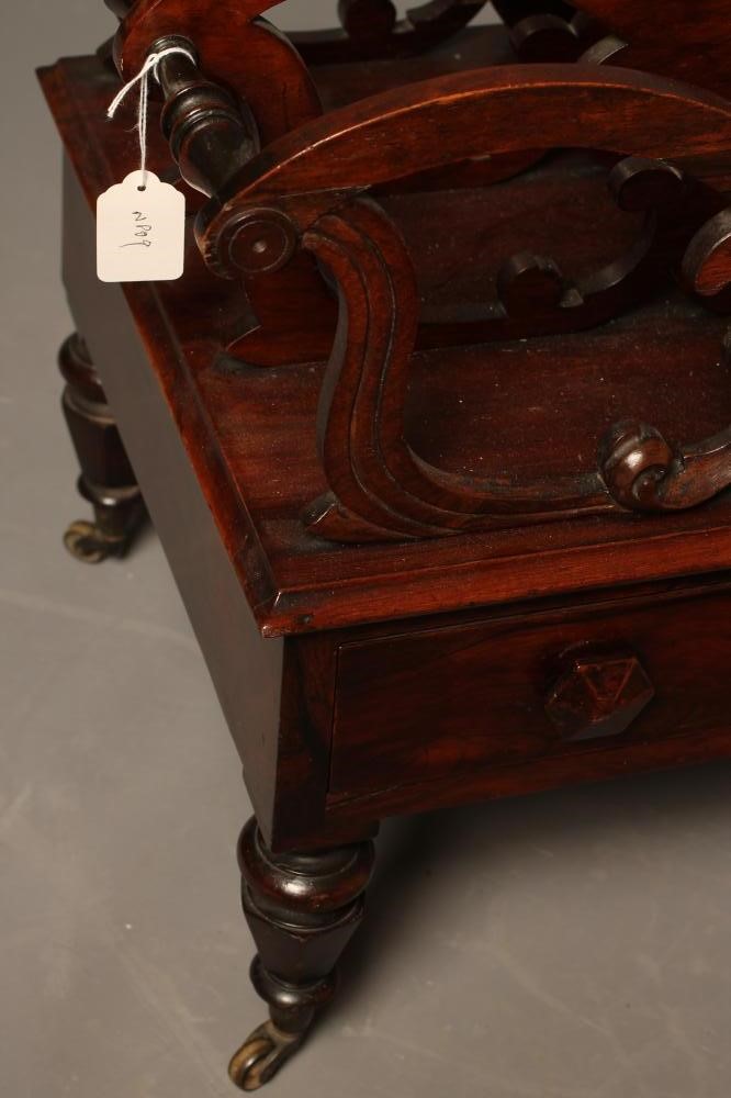 AN EARLY VICTORIAN ROSEWOOD CANTERBURY of oblong form applied with roundels Image