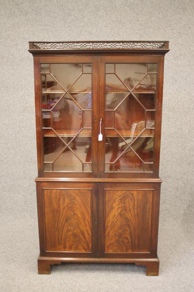 A GEORGIAN DESIGN MAHOGANY TWO STAGE BOOKCASE Image