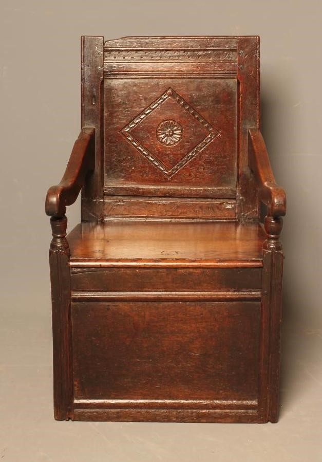 A SMALL JOINED OAK ARMCHAIR Image