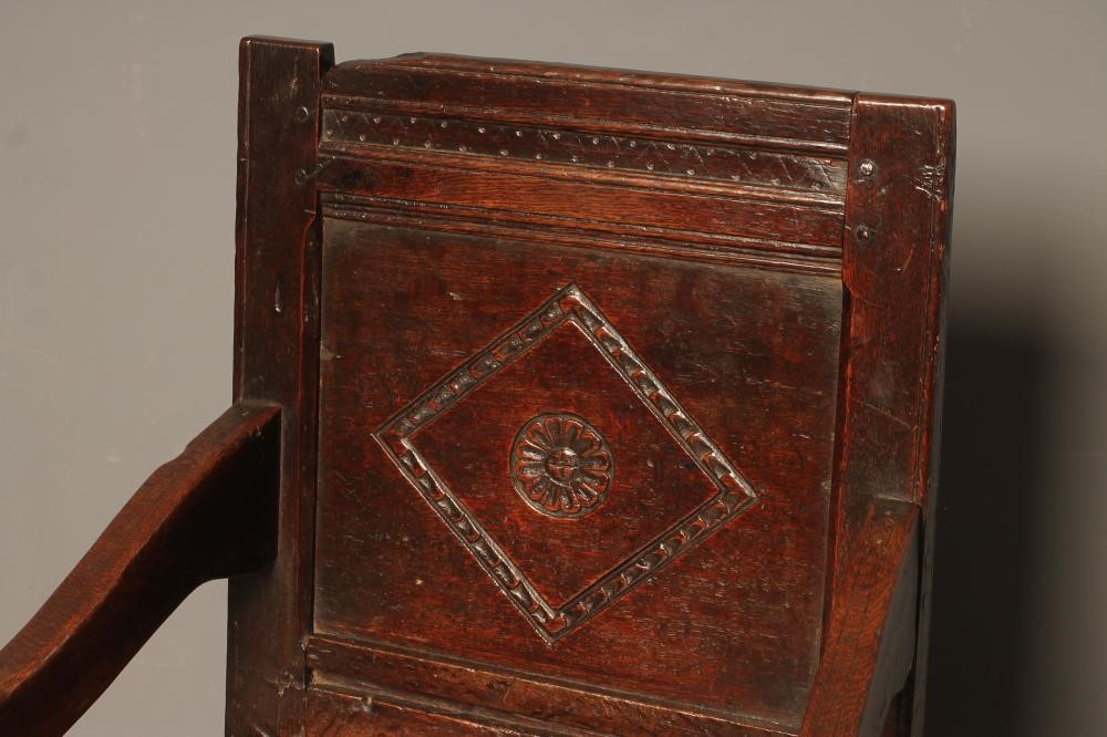 A SMALL JOINED OAK ARMCHAIR Image