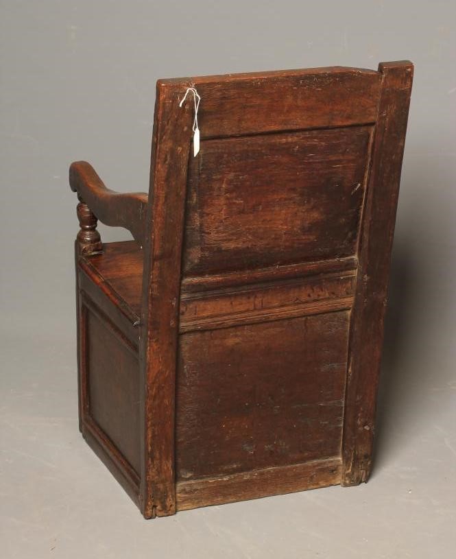 A SMALL JOINED OAK ARMCHAIR Image