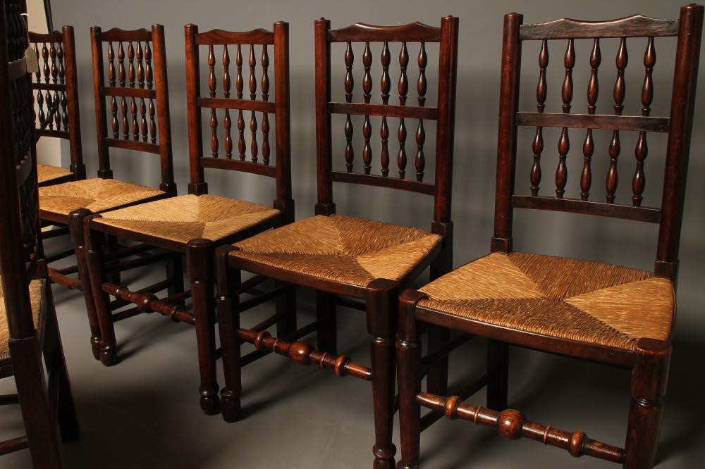 A MATCHED SET OF TEN ASH RUSH SEATED DINING CHAIRS Image