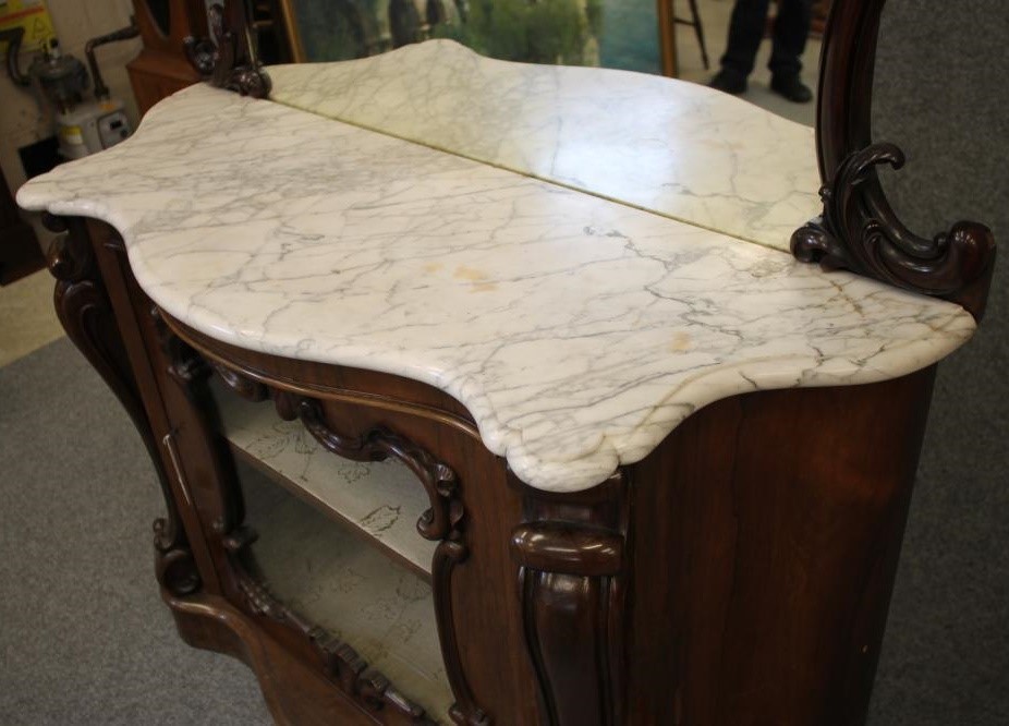 A VICTORIAN ROSEWOOD CREDENZA of serpentine form with white veined marble top Image
