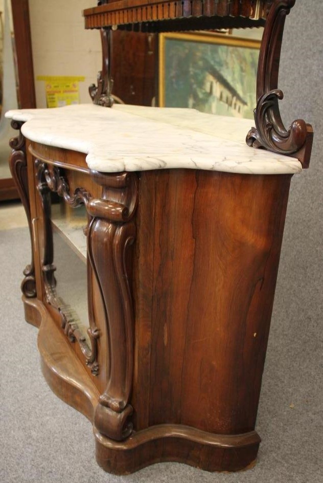A VICTORIAN ROSEWOOD CREDENZA of serpentine form with white veined marble top Image