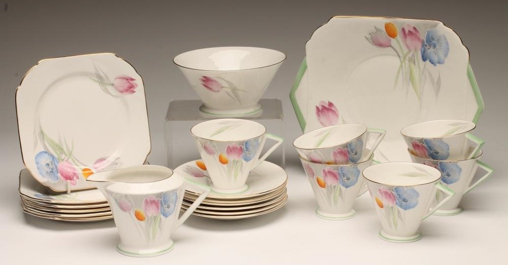 AN ART DECO SHELLEY CHINA TEA SERVICE printed in grey and over painted in pink Image