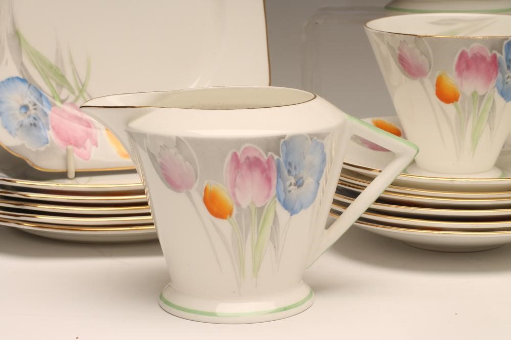 AN ART DECO SHELLEY CHINA TEA SERVICE printed in grey and over painted in pink Image