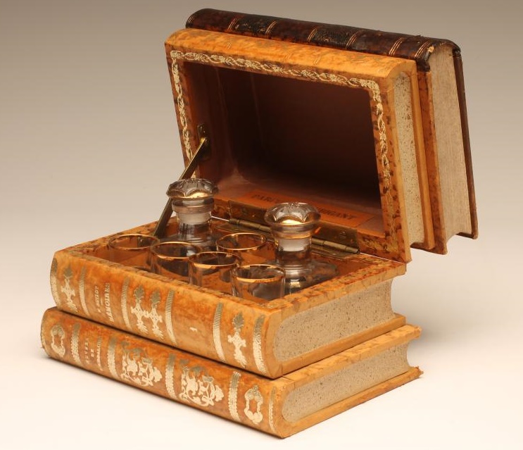 "PARFUMES HOUBIGANT" - a novelty casket modelled as a stack of four leather bound books Image