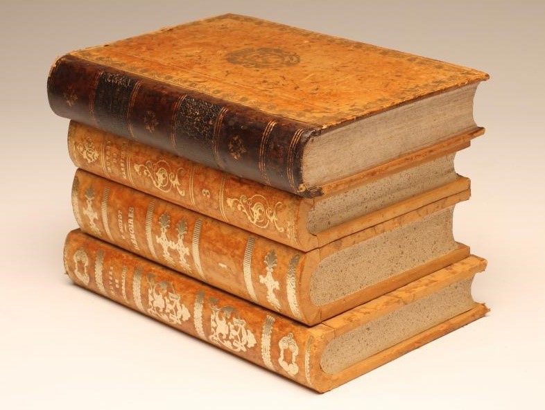 "PARFUMES HOUBIGANT" - a novelty casket modelled as a stack of four leather bound books Image