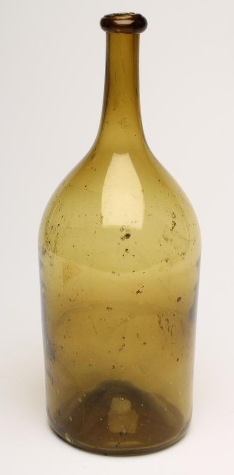 A LARGE GREEN GLASS BOTTLE Image