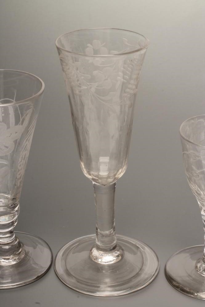A SET OF THREE GEORGIAN WINE GLASSES Image