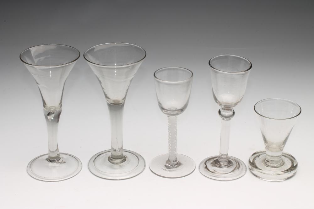 A COLLECTION OF FIVE WINE GLASSES Image