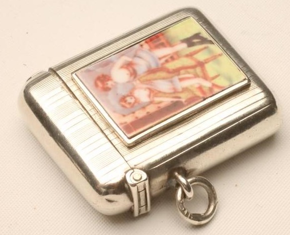 AN EDWARDIAN SILVER AND ENAMEL VESTA CASE Image