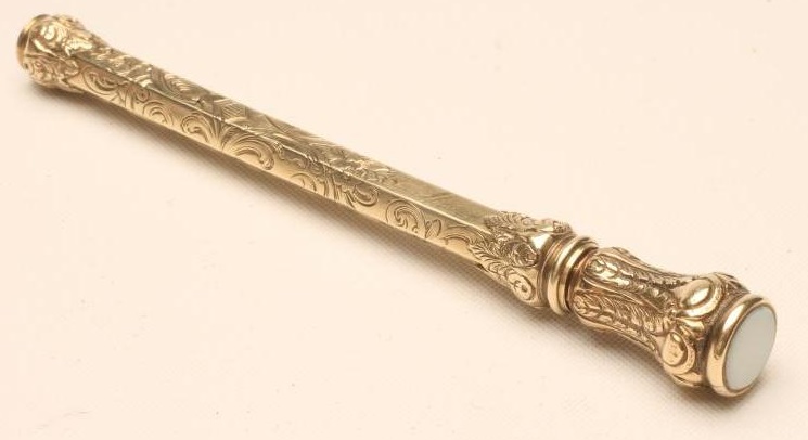 A VICTORIAN GILT METAL TELESCOPIC PENCIL of hexagonal form Image