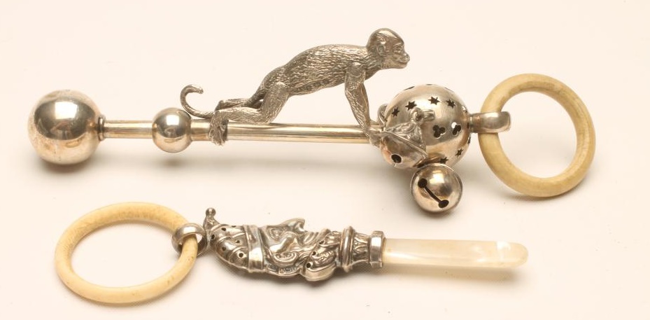 TWO EDWARDIAN SILVER RATTLES Image