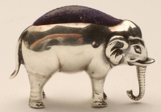 AN EDWARDIAN SILVER NOVELTY ELEPHANT PIN CUSHION Image