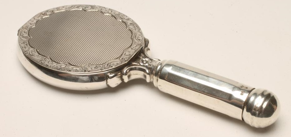 A CONTINENTAL NOVELTY COMPACT Image