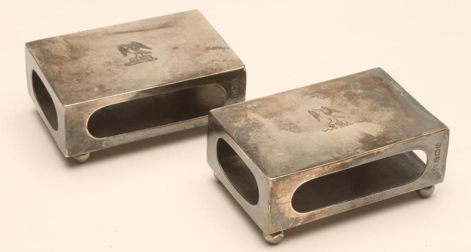 A PAIR OF SILVER MATCHBOX HOLDERS Image