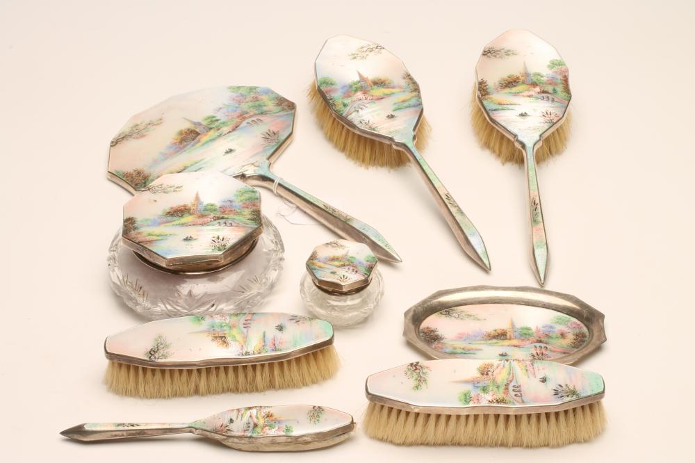AN ART DECO NINE PIECE SILVER DRESSING TABLE SET Image