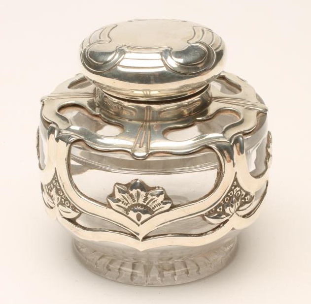 AN EDWARDIAN SILVER MOUNTED GLASS INKWELL Image