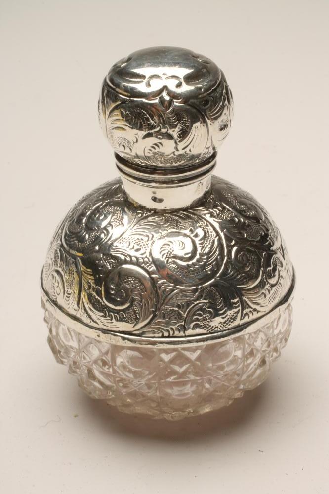 A SILVER MOUNTED SCENT BOTTLE Image