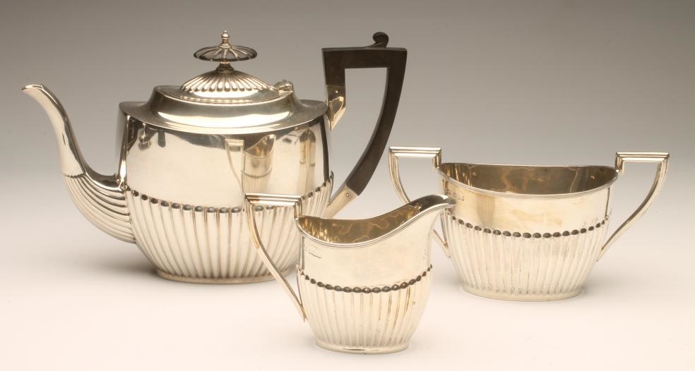*A THREE PIECE TEA SERVICE Image