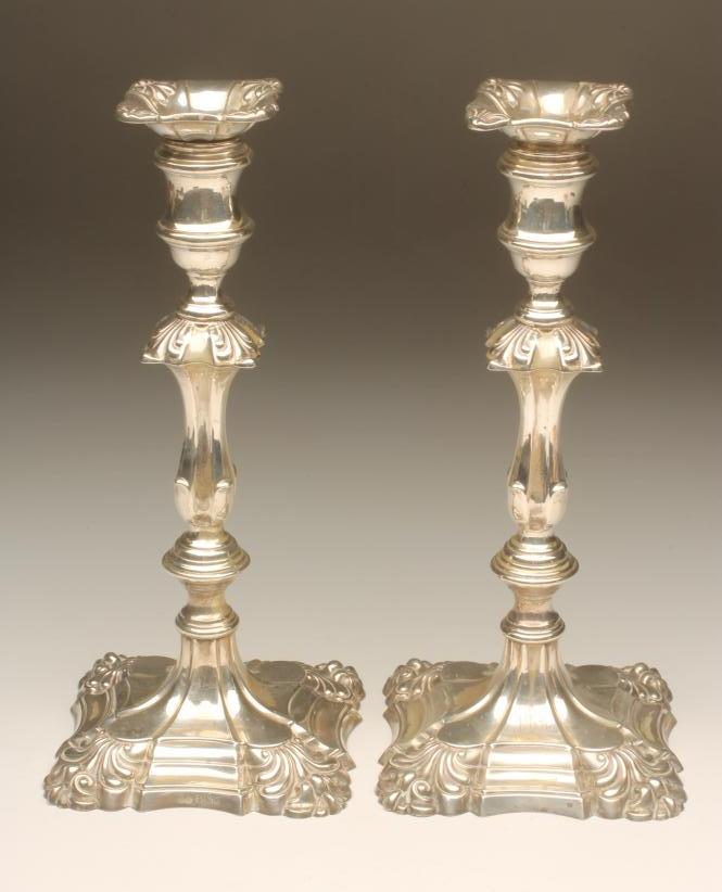 A PAIR OF SILVER GEORGIAN STYLE CANDLESTICKS Image