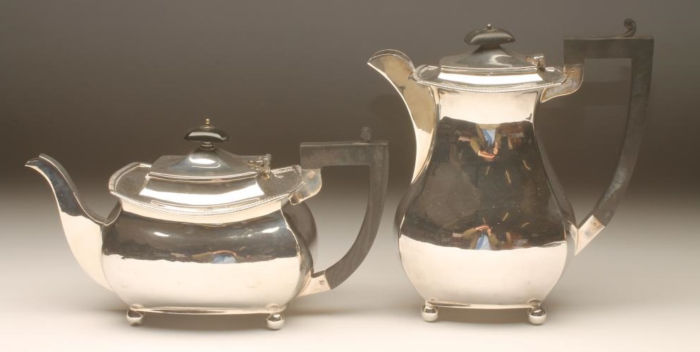 *A SILVER TEA AND COFFEE POT Image