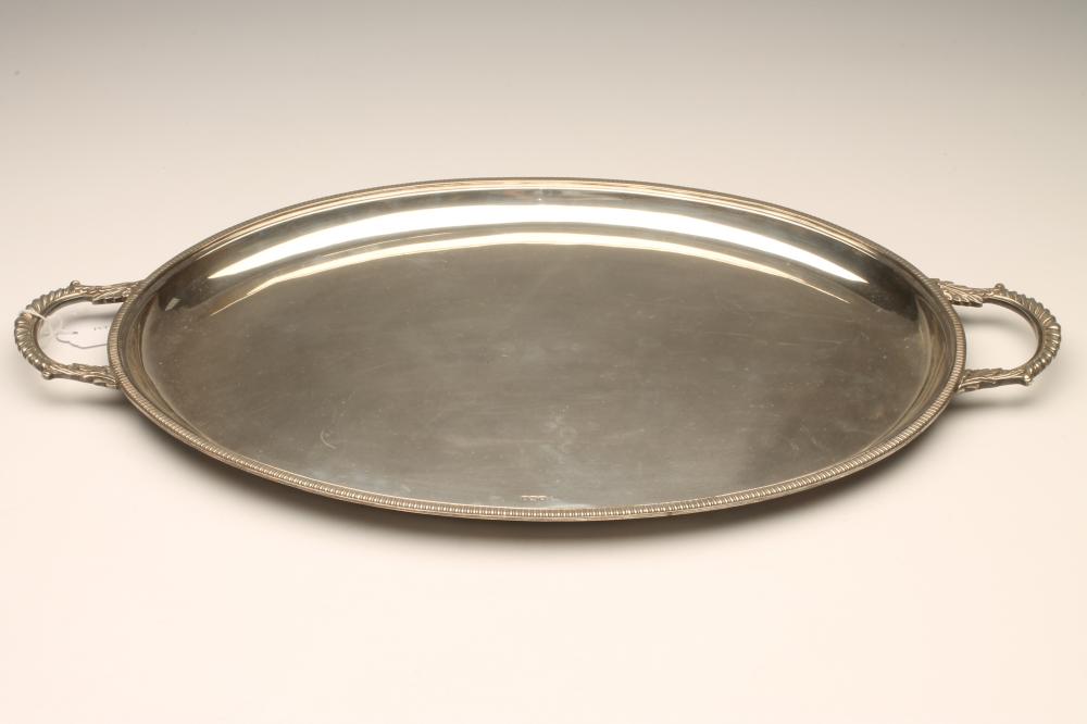 A SILVER TWO HANDLED TRAY Image