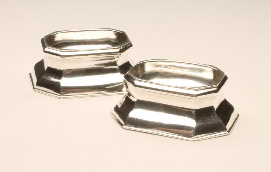 A COMPOSITE PAIR OF GEORGE I SILVER TRENCHER SALTS Image