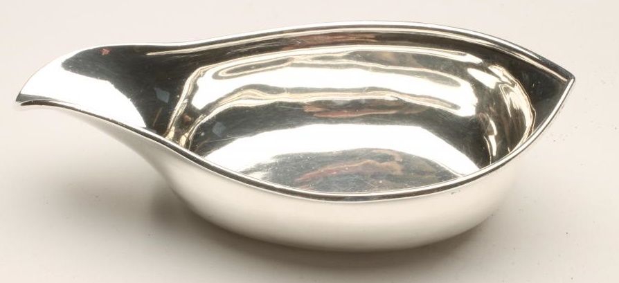 A LATE GEORGE III SILVER PAP BOAT Image