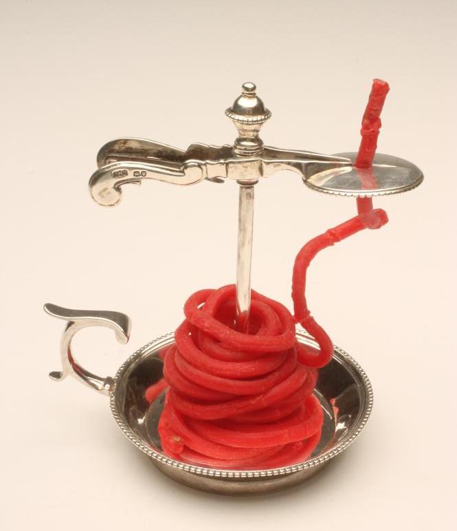 A LATE VICTORIAN SILVER WAX JACK Image