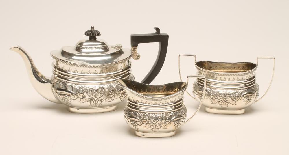 A BACHELOR'S LATE VICTORIAN SILVER THREE PIECE TEA SERVICE Image
