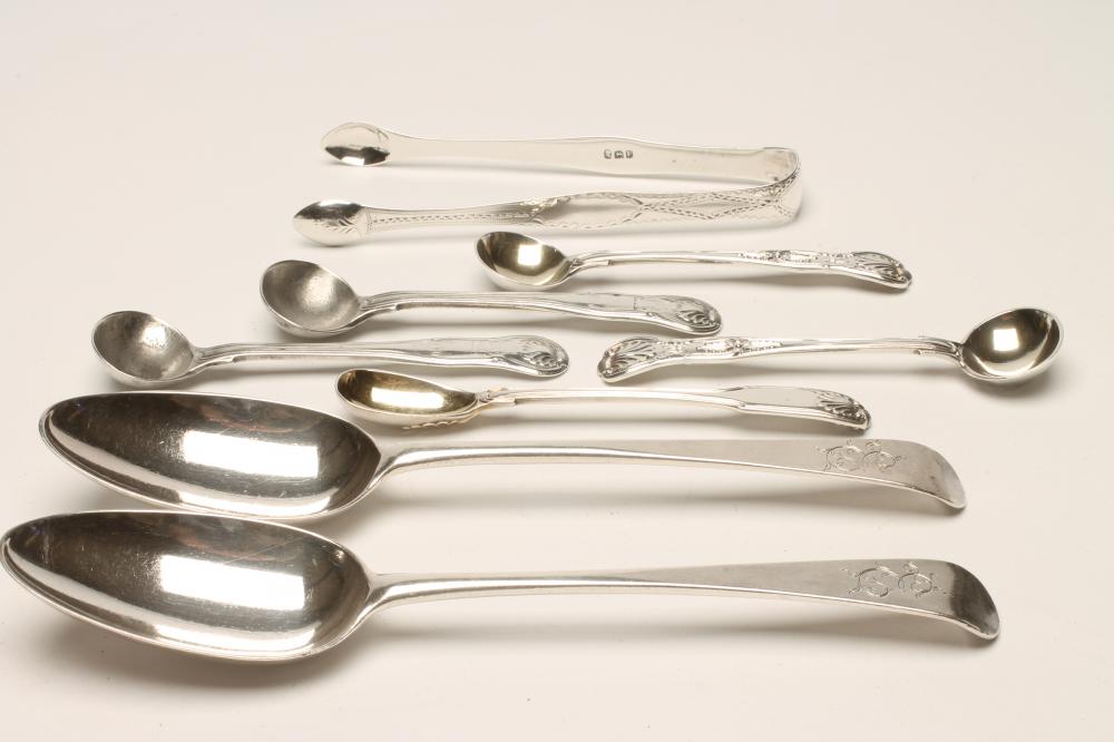 *A COLLECTION OF GEORGIAN AND LATER SILVER FLATWARE comprising a pair of bright cut engraved sugar Image