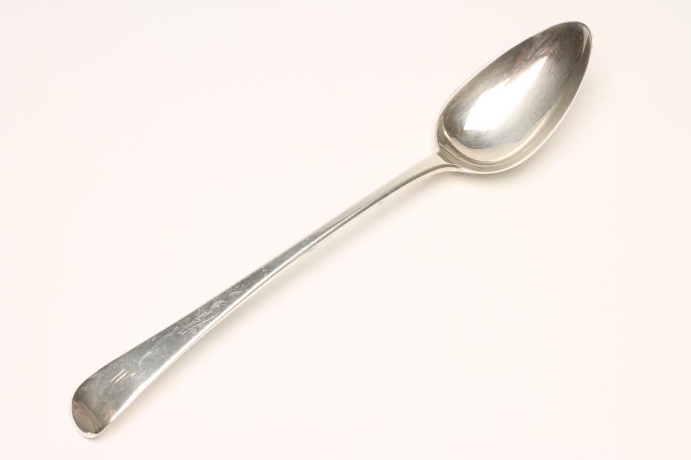 A LATE GEORGE III SILVER BASTING SPOON Image