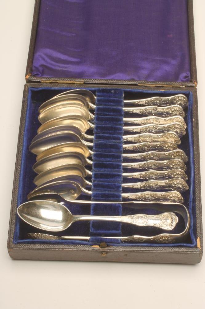 A SET OF TWELVE VICTORIAN SCOTTISH SILVER TEASPOONS AND MATCHING SUGAR TONGS Image
