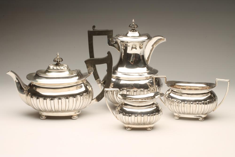 A LATE VICTORIAN SILVER FOUR PIECE TEA AND COFFEE SERVICE Image