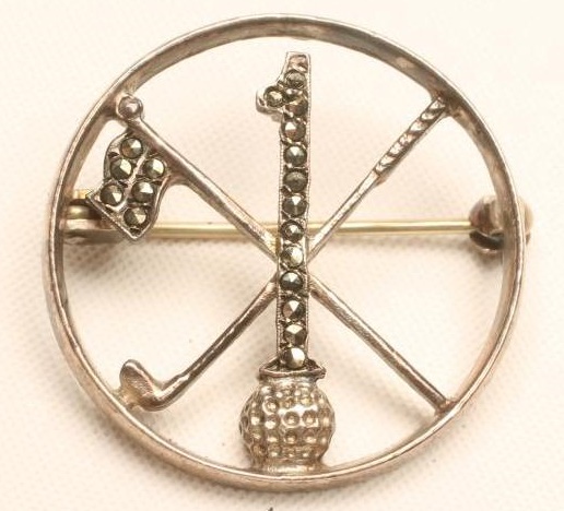 A SILVER AND MARCASITE "HOLE IN ONE" GOLF BADGE Image