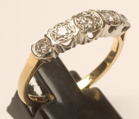 A FIVE STONE DIAMOND RING Image